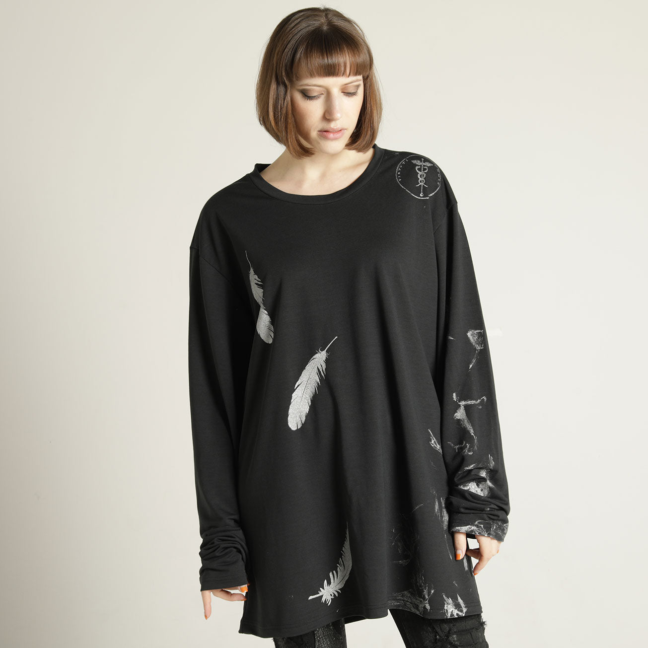 Ultra L silhouette feather TOPS
