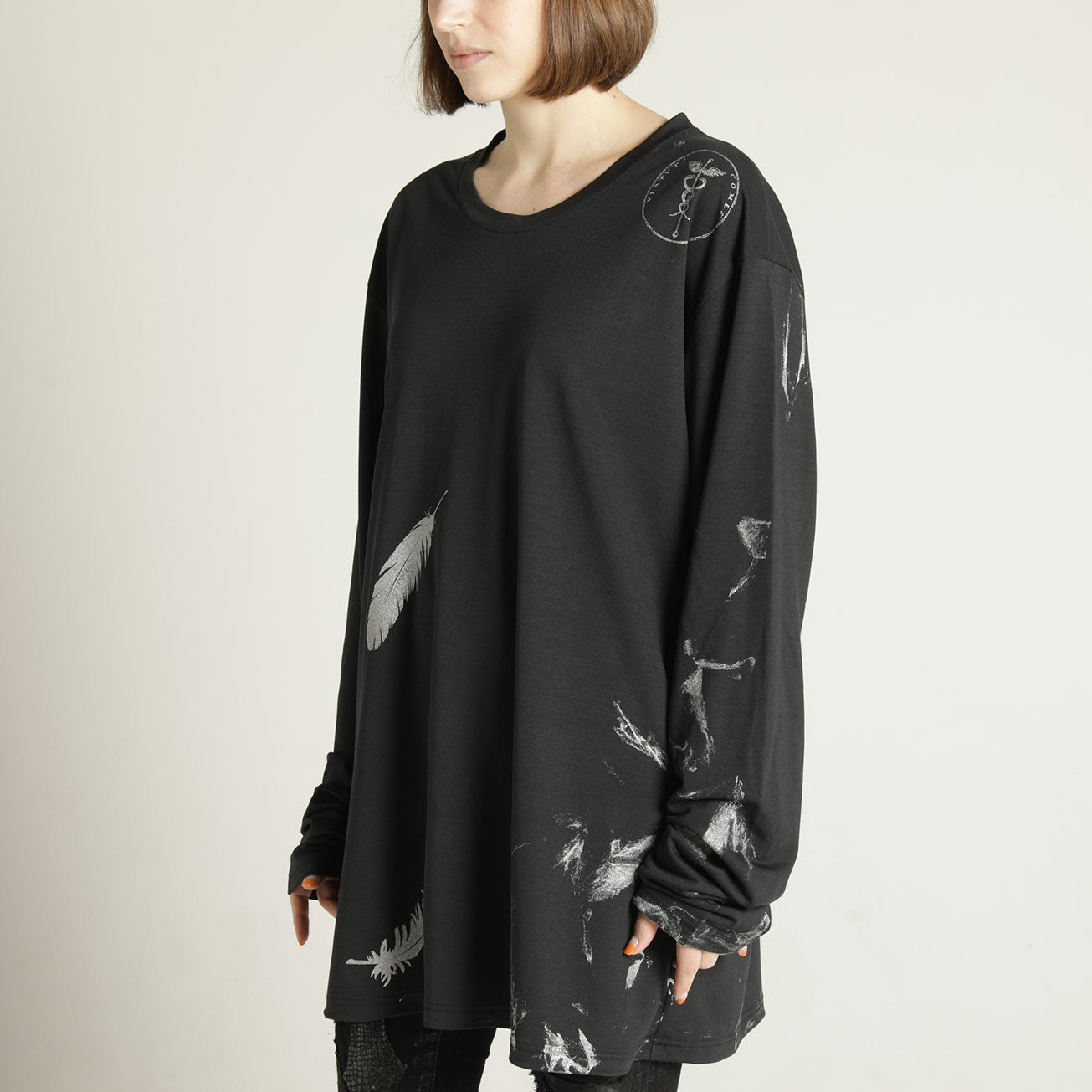 Ultra L silhouette feather TOPS